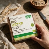 FRANKENKORN Bio Urtyp Brot in Verpackung auf Holztisch...